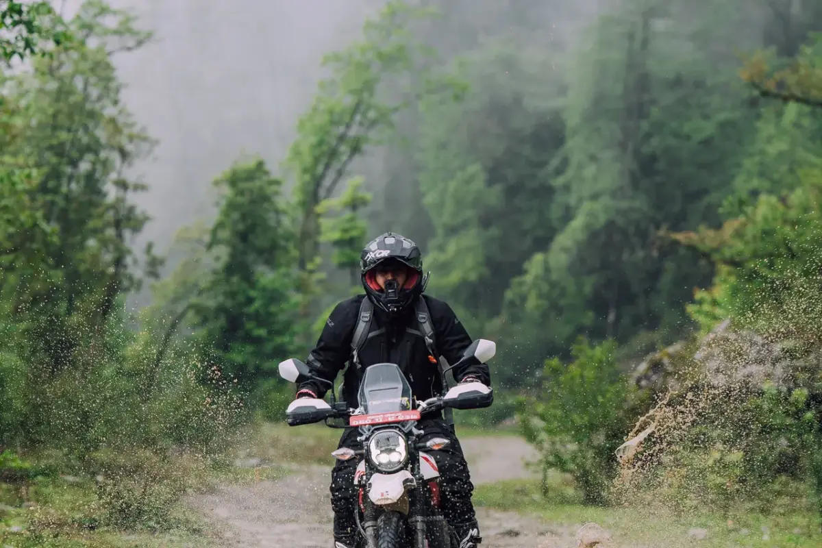 Rider on a misty forest trail on the outskirts of the Kathmandu Valley