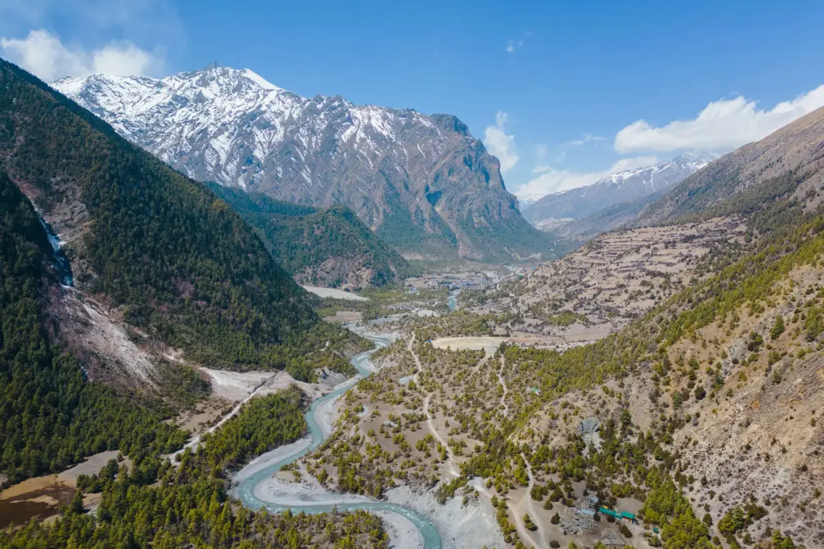 Aerial view of the Marsyangdi valley below the snow peaks, Manang